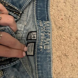 Light colored jeans. Size 24